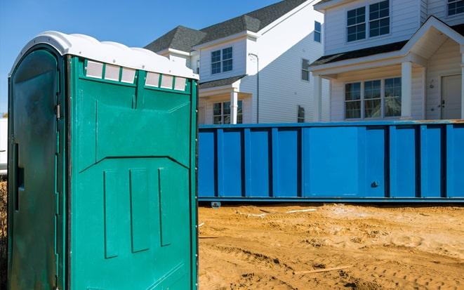 dumpster and portable toilet at a construction site project in Turlock CA